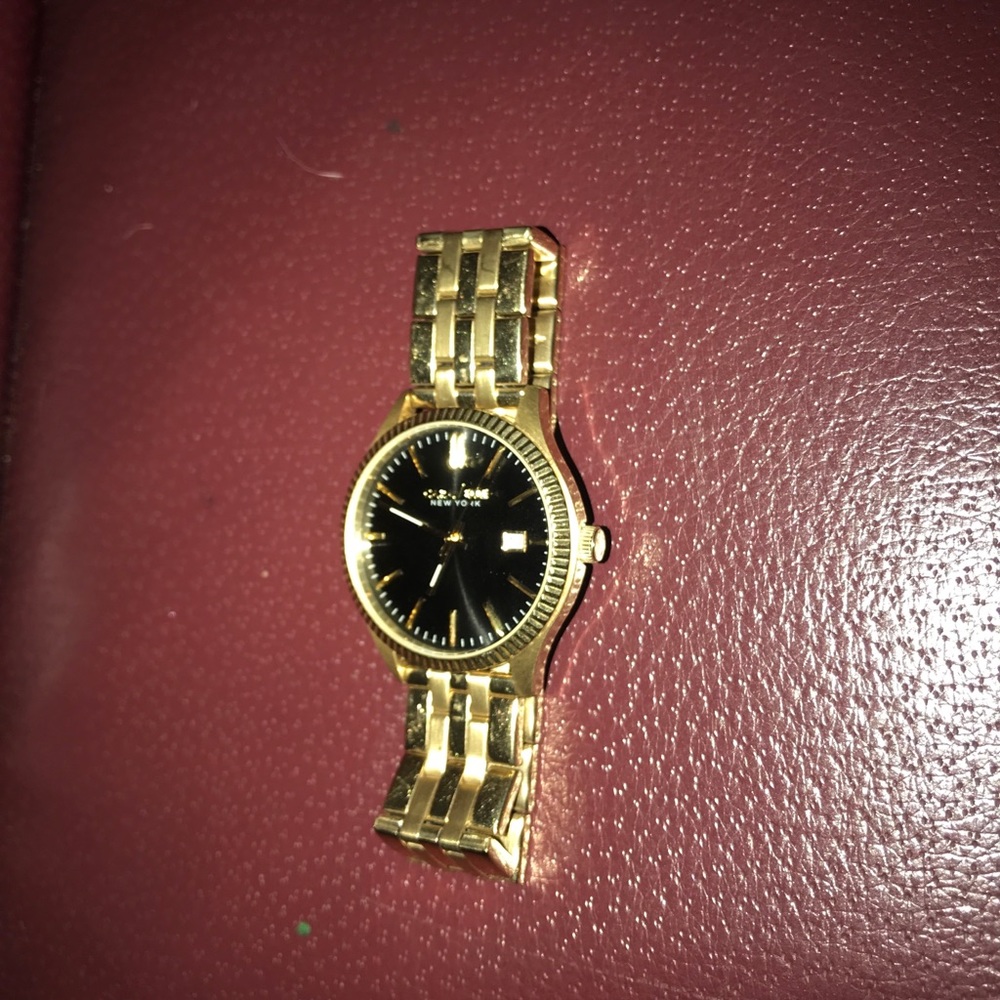 A gold and black watch